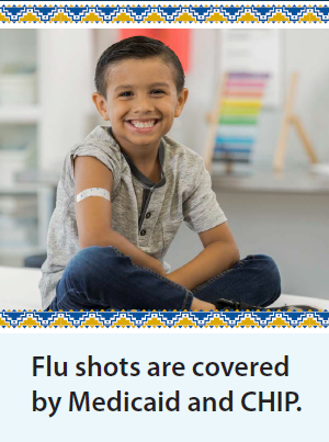 Image of a smiling boy afer having received a flu shot