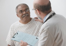 Image of a doctor talking to a patient