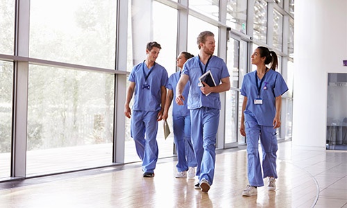 image of medical professionals walking