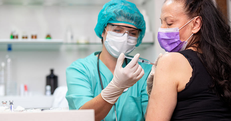 photo of a person receiving a vaccination