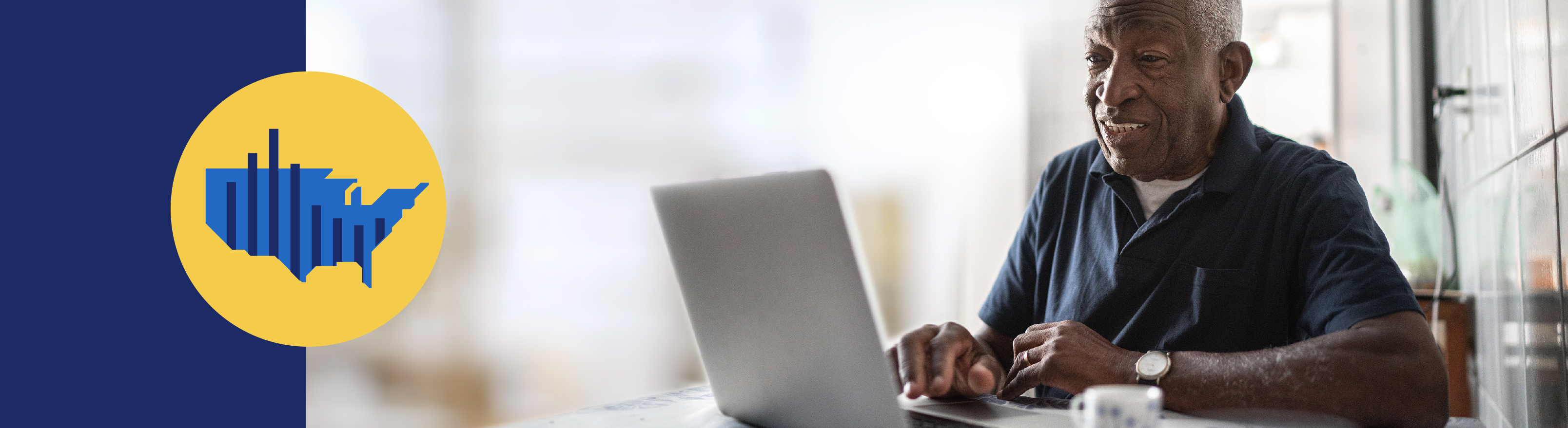 Smiling man with open laptop and icon of US map overlayed with bargraph