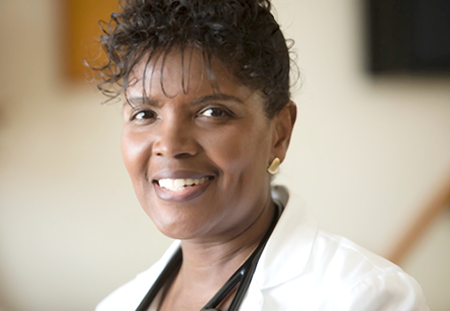 A smiling black female doctor